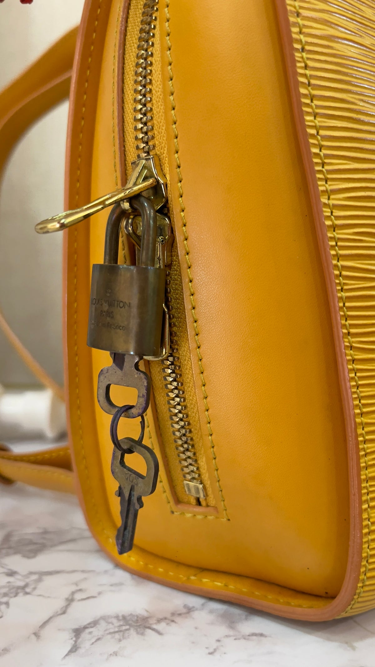 Louis Vuitton Mabillon Backpack Epi Leather Tassil Yellow PRE OWNED